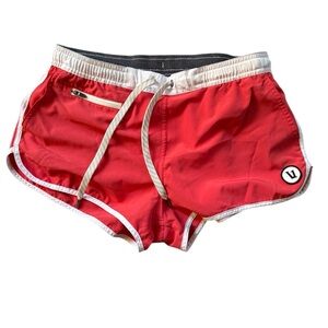 Vuori Tavi Athletic Shorts with drawstrings and zip pocket in Melon